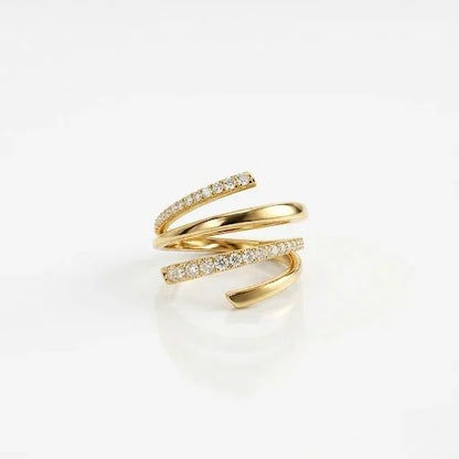 Elegant gold spiral ring with sparkling diamond accents, perfect for everyday wear or special occasions.