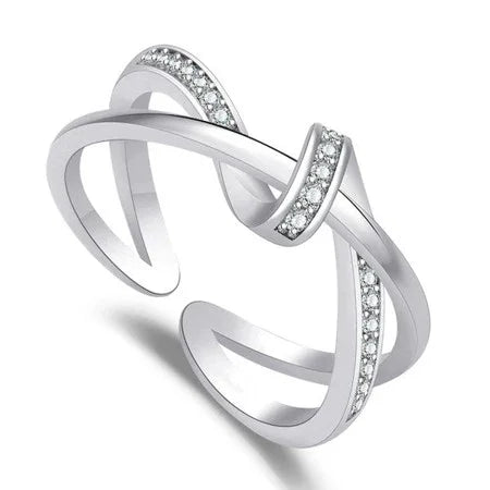 Elegant American Diamond ring with intertwined silver bands and sparkling stones