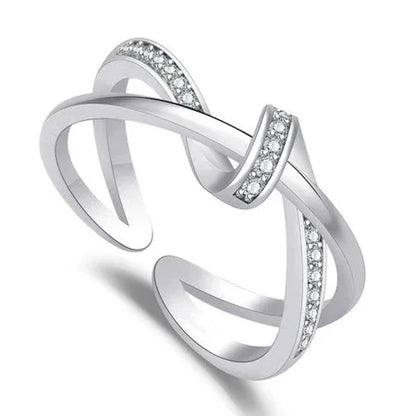 Elegant American Diamond ring with intertwined silver bands and sparkling stones
