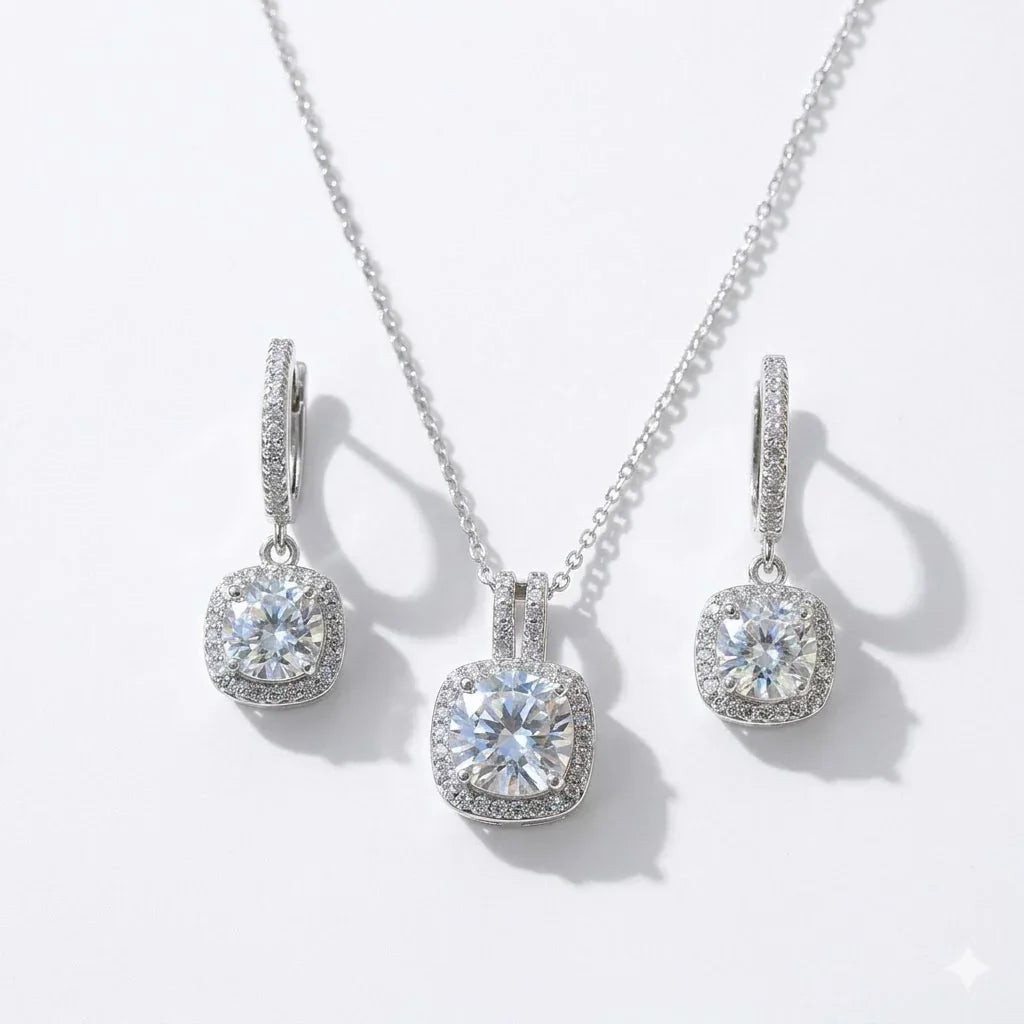 Elegant cushion-cut diamond necklace and matching hoop earrings with halo setting