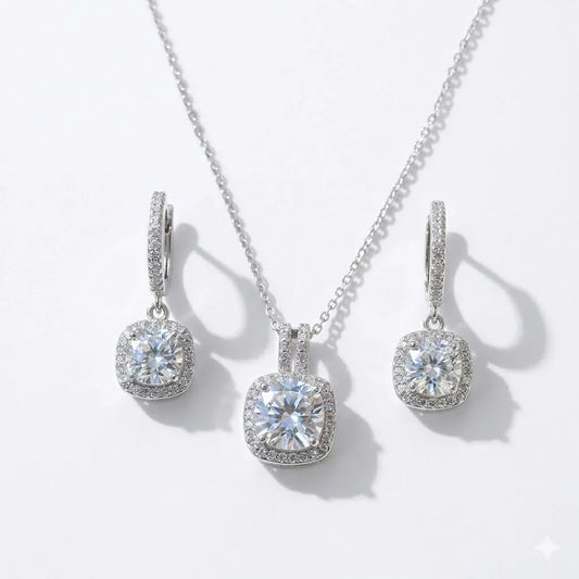 Elegant cushion-cut diamond necklace and matching hoop earrings with halo setting