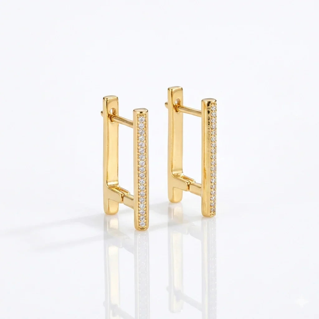 Gold bar earrings with sparkling diamond accents, modern minimalist design