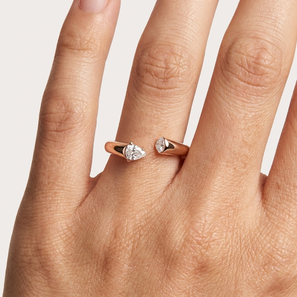 Pear cut diamond ring in rose gold, elegant American diamond piece on hand